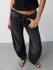 The Free Fable Low-Rise Twisted Bowed Jeans
