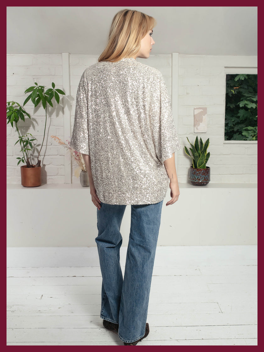 Glamorous gold sequin jacket with relaxed kimono styling